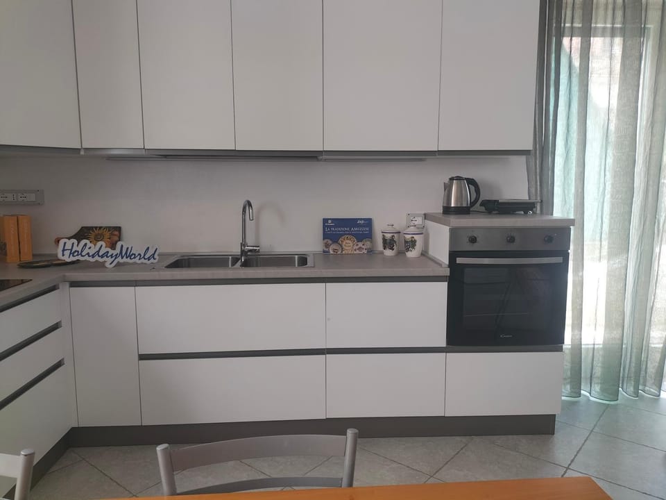 Kitchen or kitchenette, oven