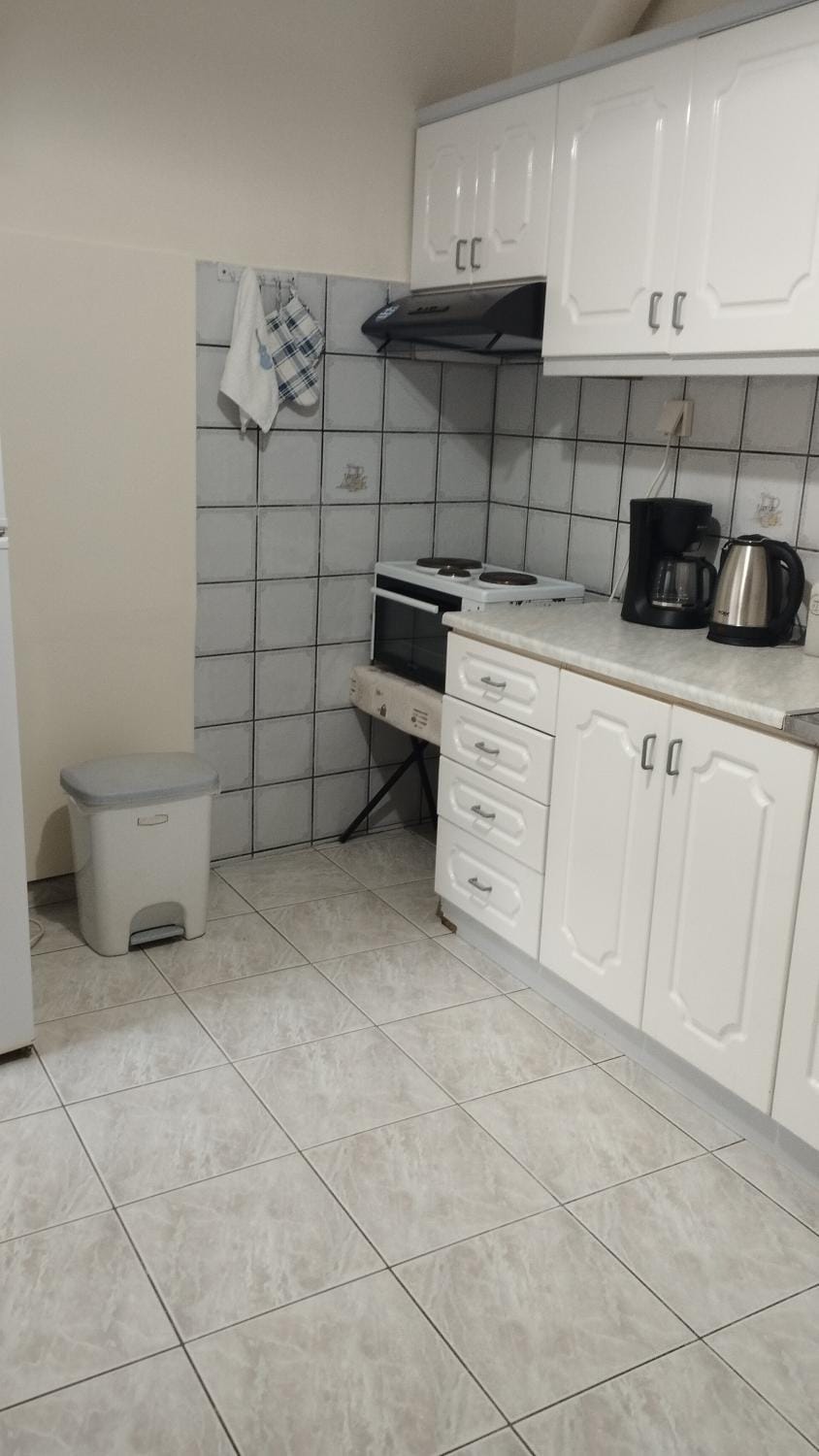 Kitchen or kitchenette, stove
