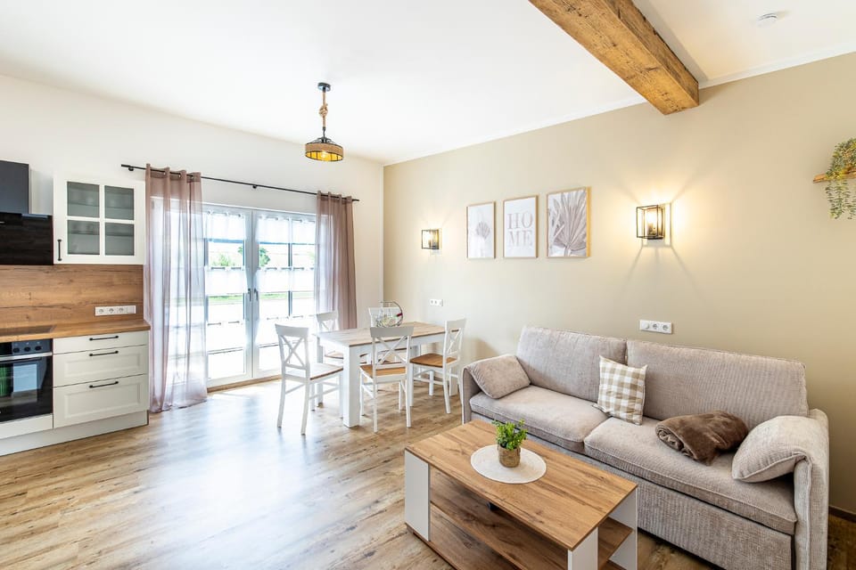 Kitchen or kitchenette, Living room, Seating area, Dining area