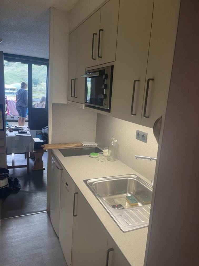 Kitchen or kitchenette, stove