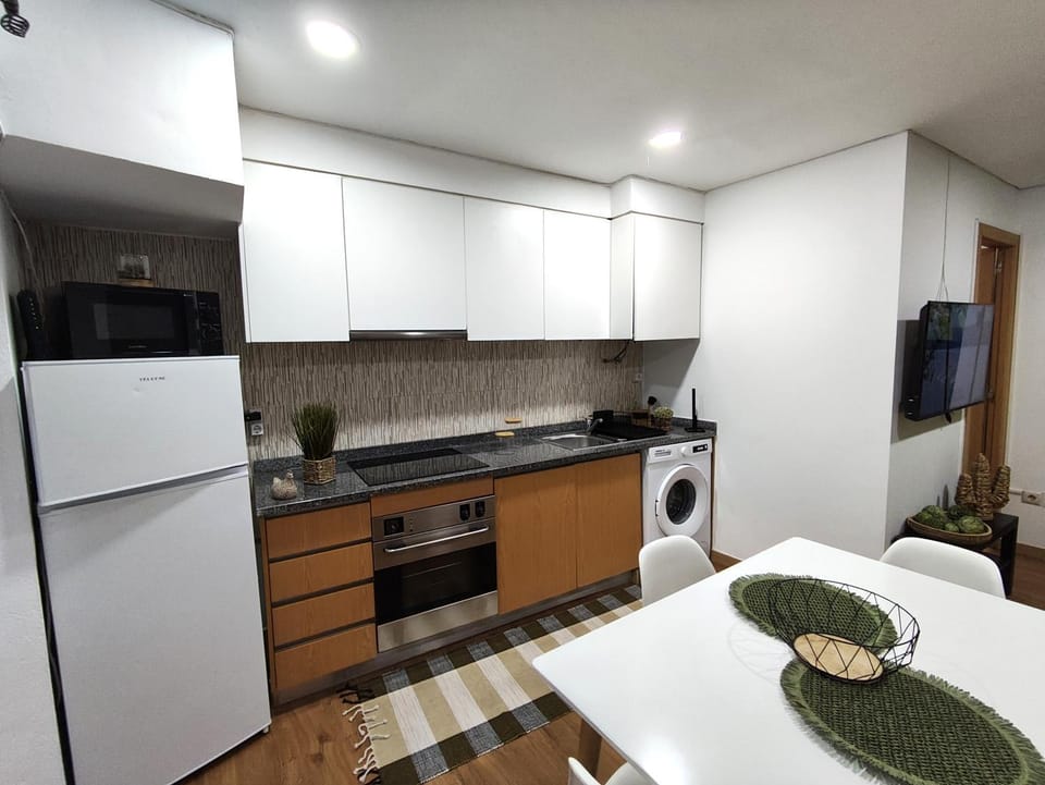 Kitchen or kitchenette, Dining area, oven, stove, toaster, washing machine