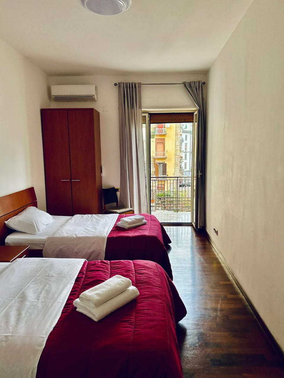 Bed, Photo of the whole room, Bedroom, towels, air conditioner