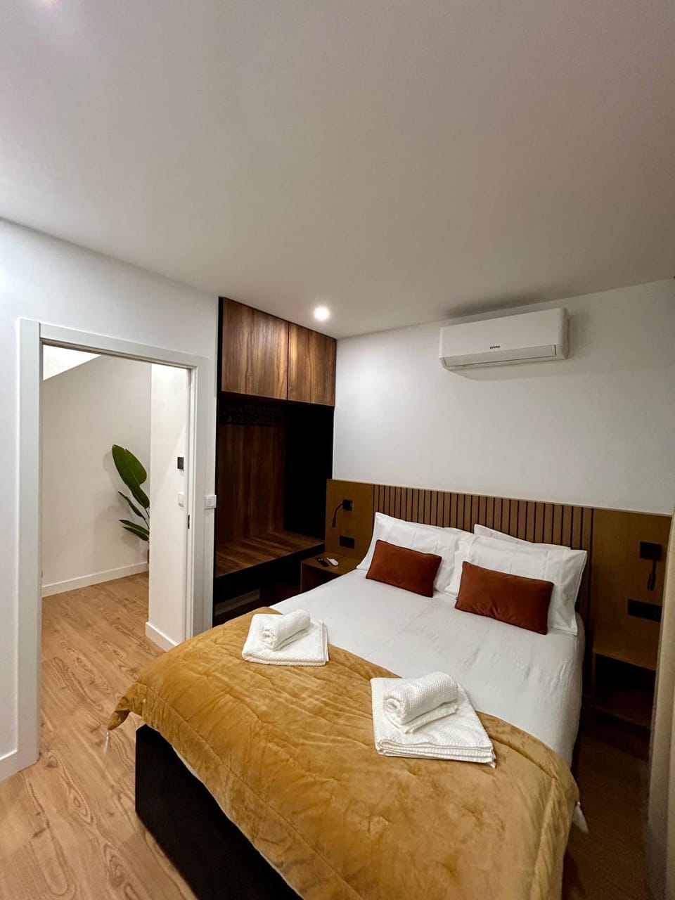 Bed, Bedroom, towels, wardrobe, air conditioner