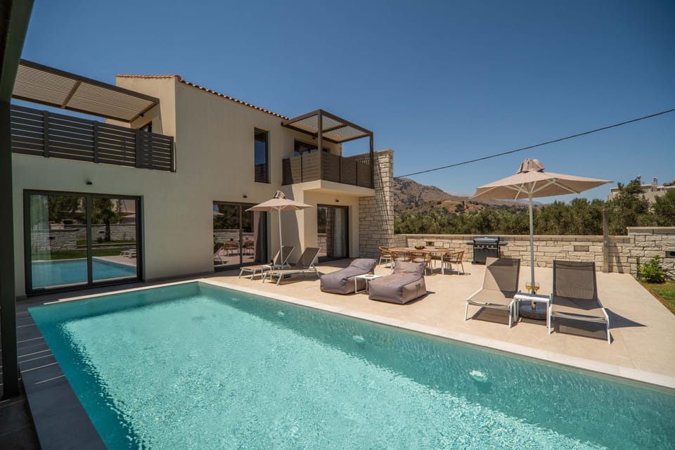 Property building, Patio, Pool view, Swimming pool, sunbed
