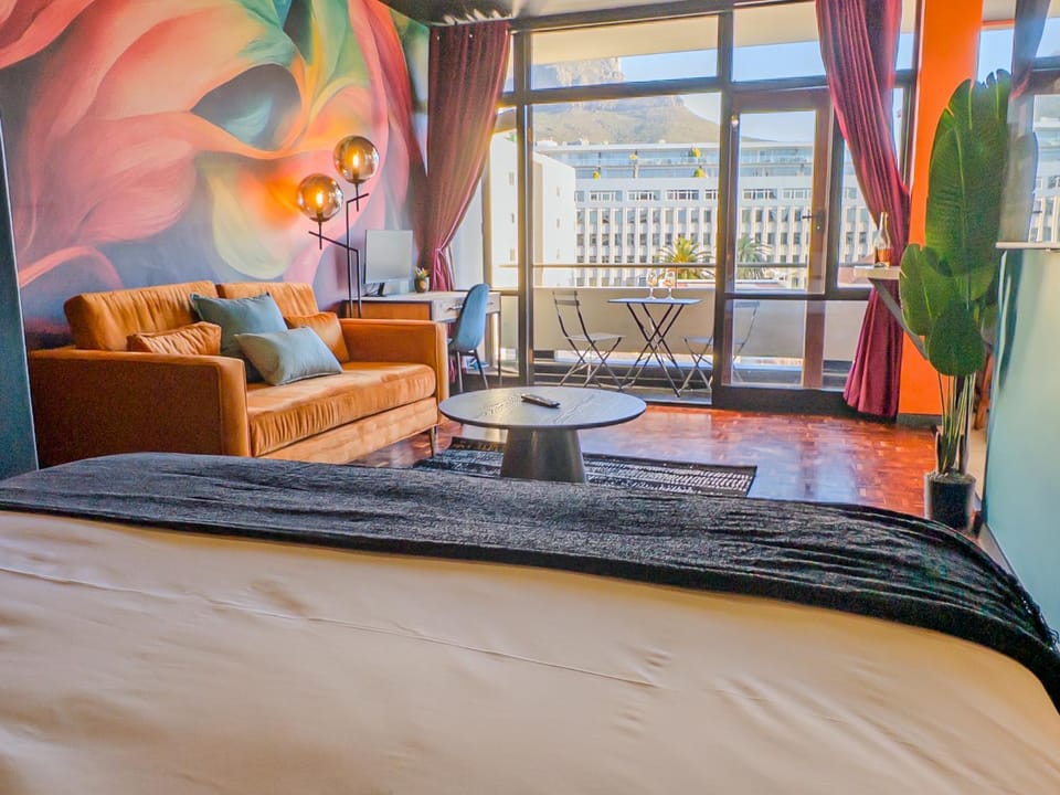 Bed, Living room, Seating area, Bedroom
