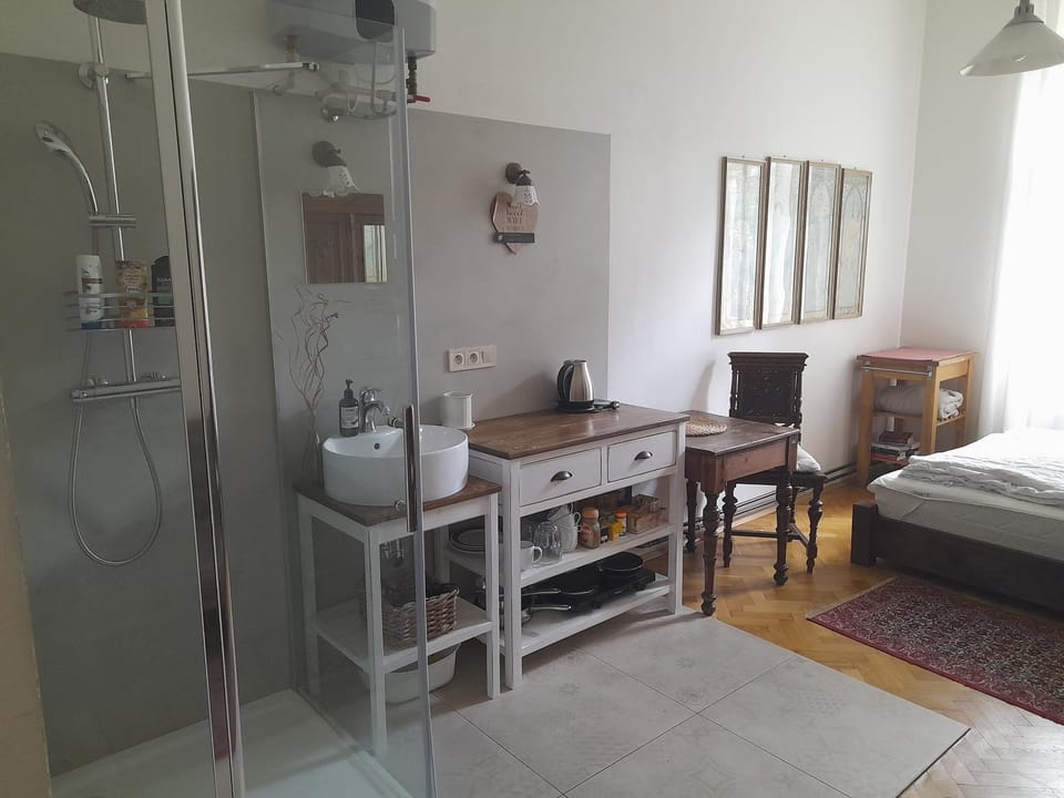 Shower, Bed, Kitchen or kitchenette