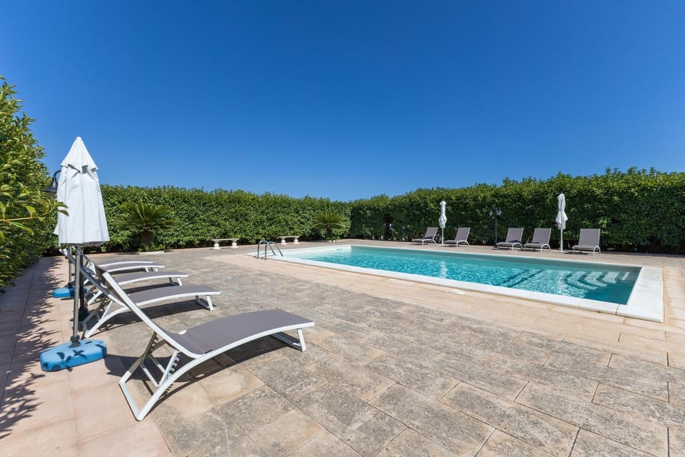 Property building, Living room, Swimming pool