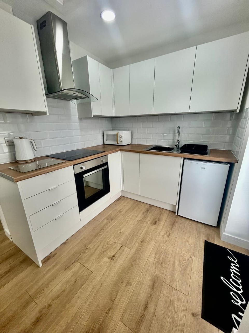 Kitchen or kitchenette, oven, stove