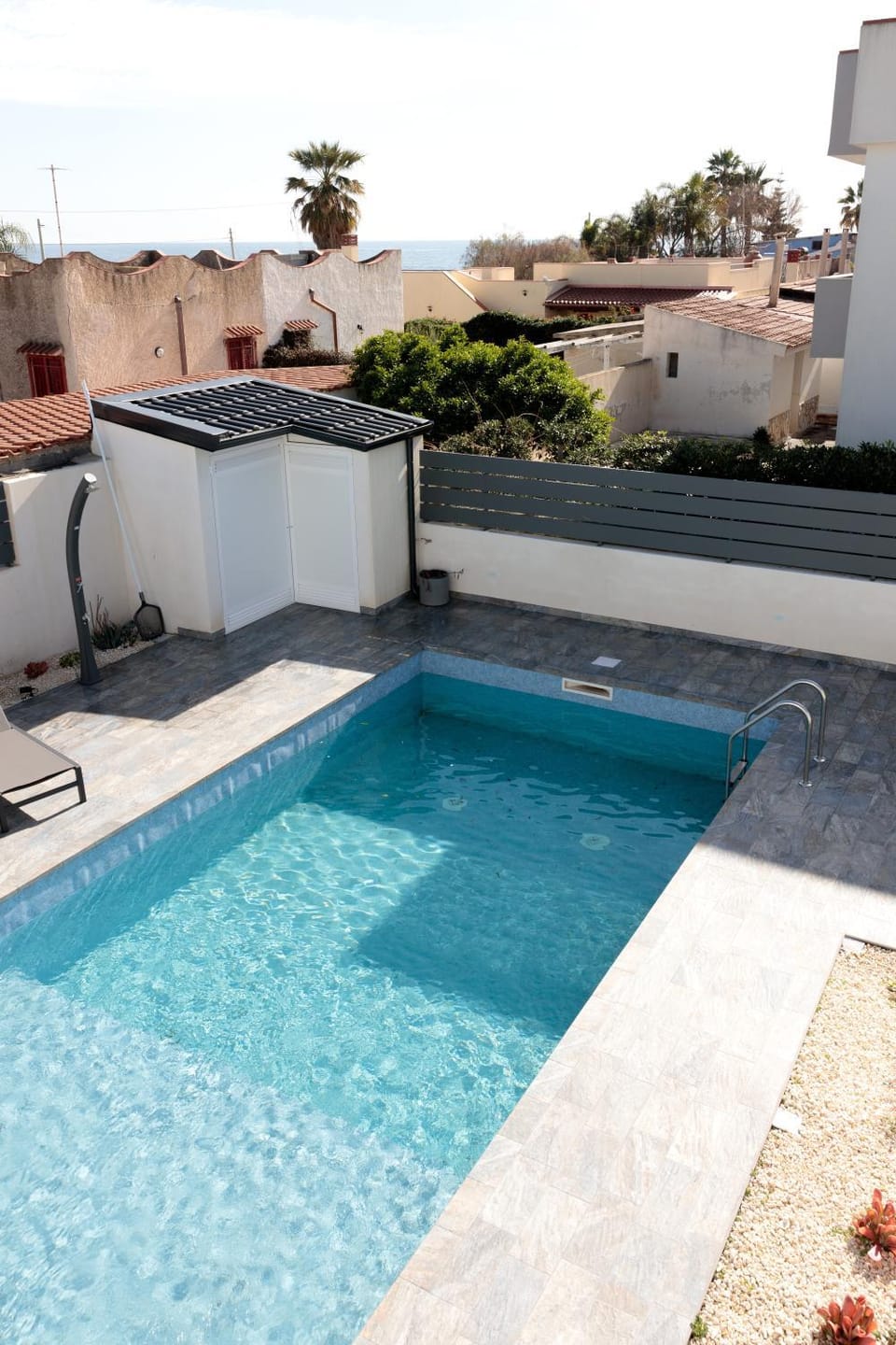 Property building, Living room, Swimming pool