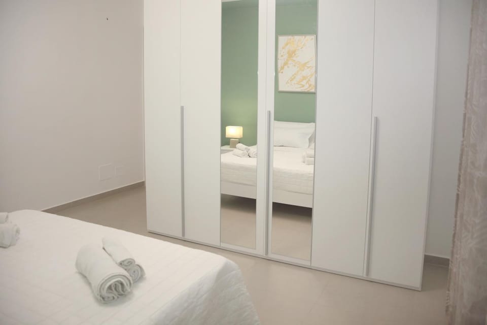 Bed, Photo of the whole room, Bedroom, towels, wardrobe