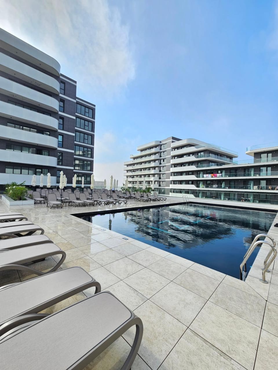 Property building, Natural landscape, Pool view, Swimming pool, sunbed