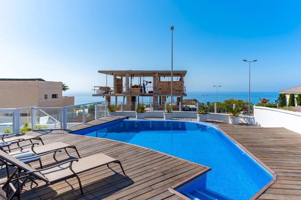 Property building, Living room, Swimming pool