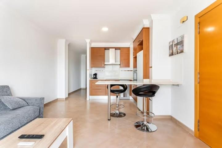 Kitchen or kitchenette, Living room, Seating area, stove