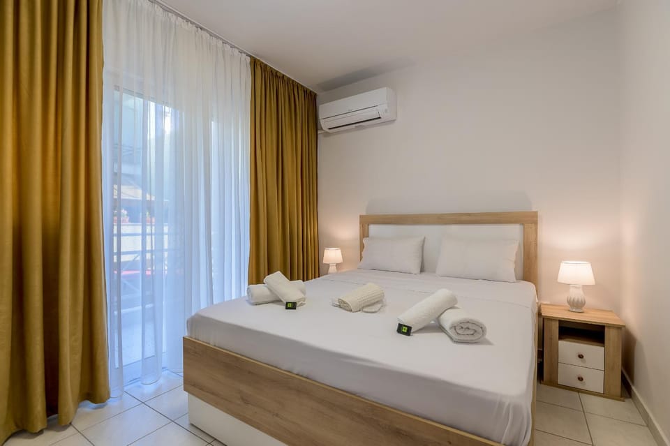 Bed, Photo of the whole room, Bedroom, towels, air conditioner