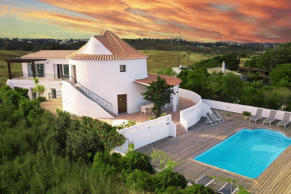 Property building, Day, Natural landscape, Pool view, Swimming pool, sunbed