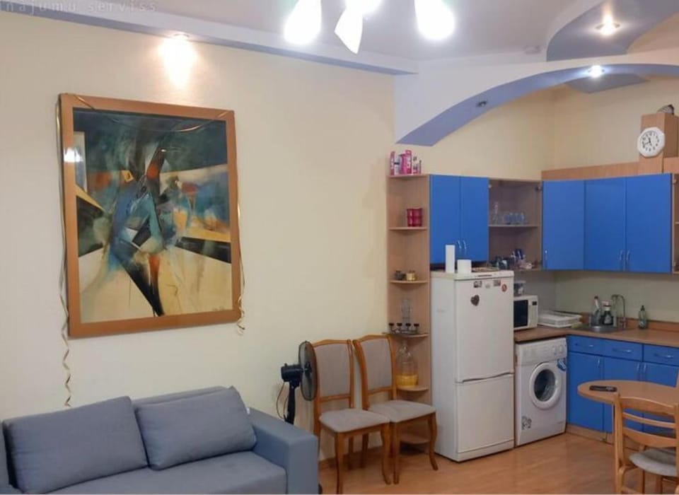 Kitchen or kitchenette, washing machine