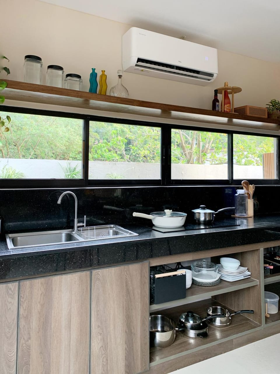 Kitchen or kitchenette, stove, air conditioner