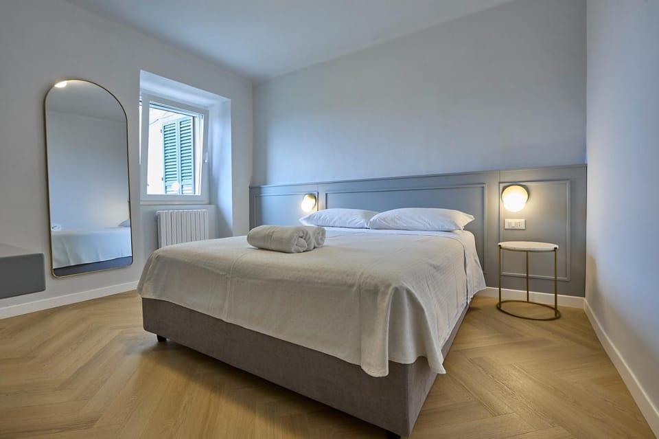 CAMERANOAPARTMENTS - Sopra la Piazza - Affittacamere Bed and Breakfast in Marche