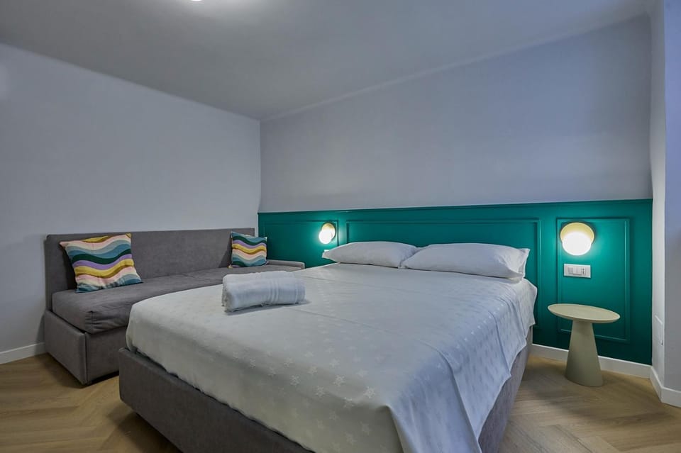 CAMERANOAPARTMENTS - Sopra la Piazza - Affittacamere Bed and Breakfast in Marche