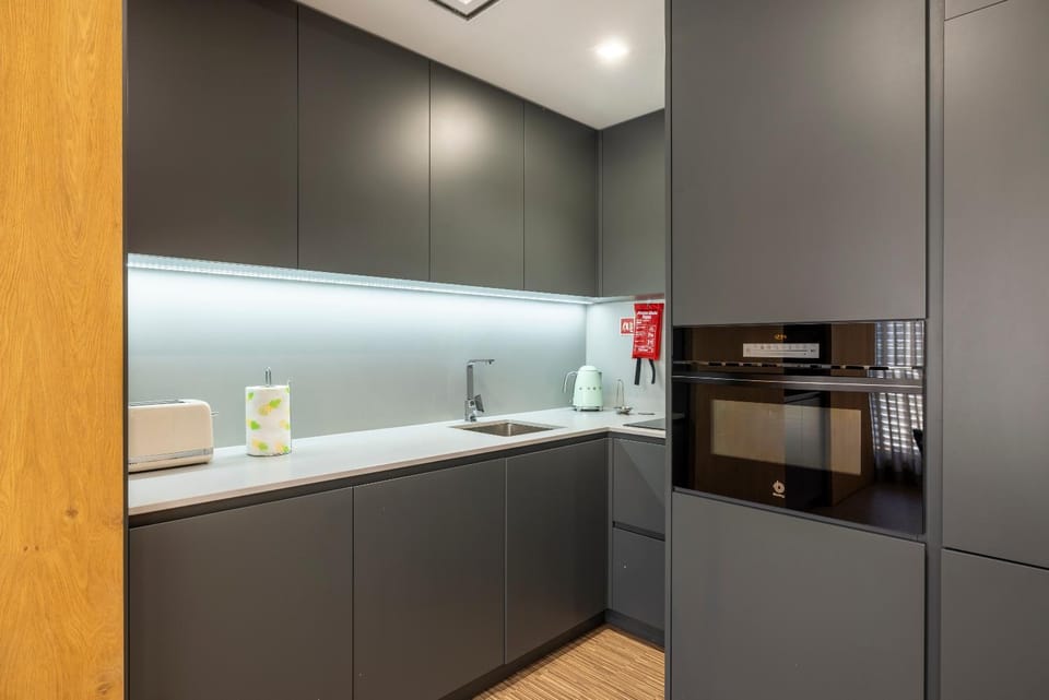 Kitchen or kitchenette, oven, stove