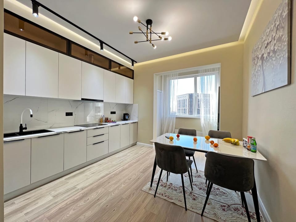 Kitchen or kitchenette, Dining area, dishwasher, minibar, stove
