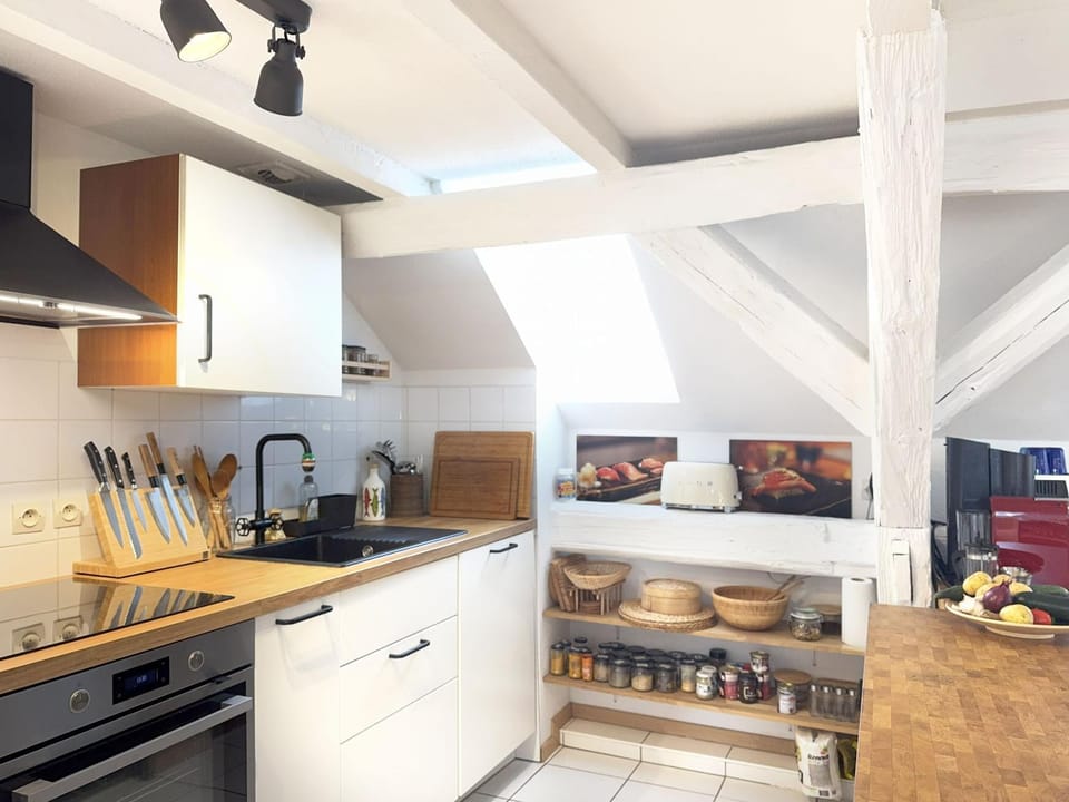 Kitchen or kitchenette, dishwasher, oven, stove, toaster