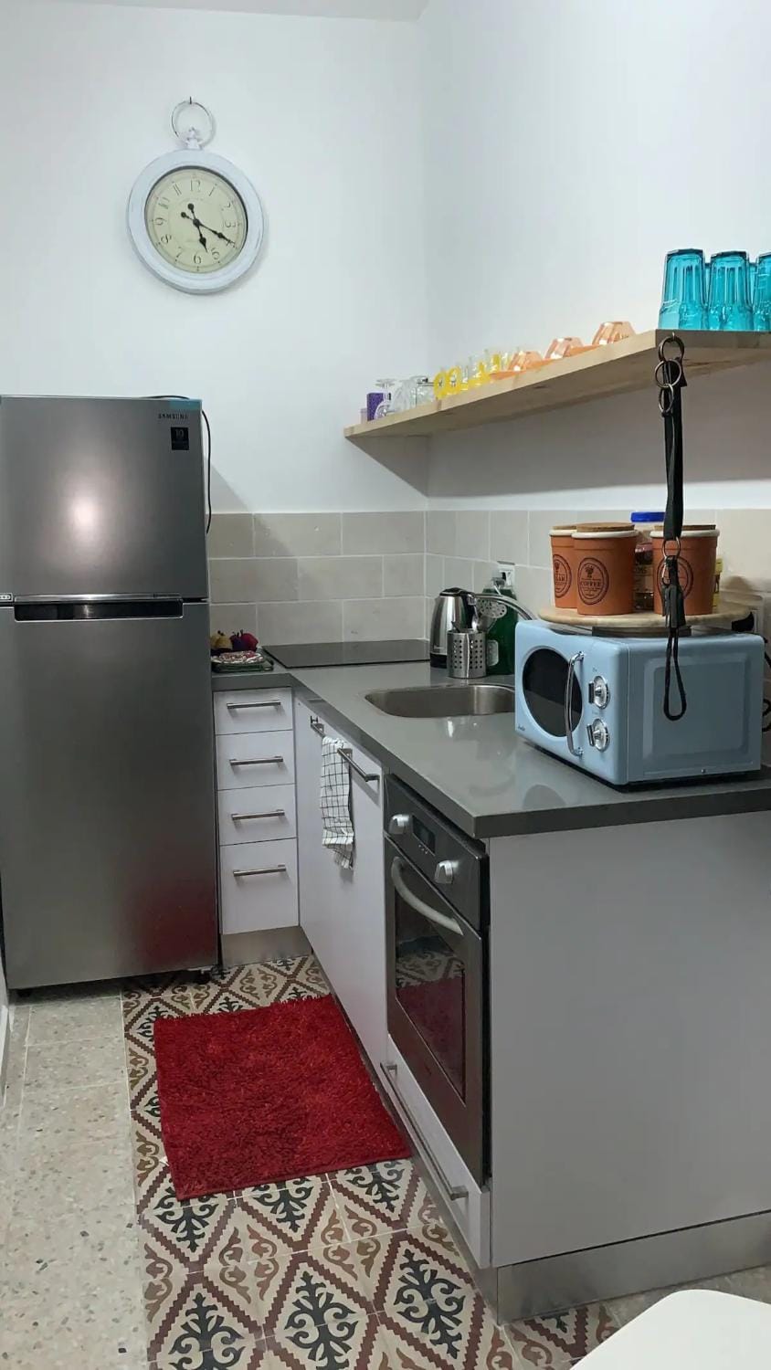 Kitchen or kitchenette, oven, stove, toaster