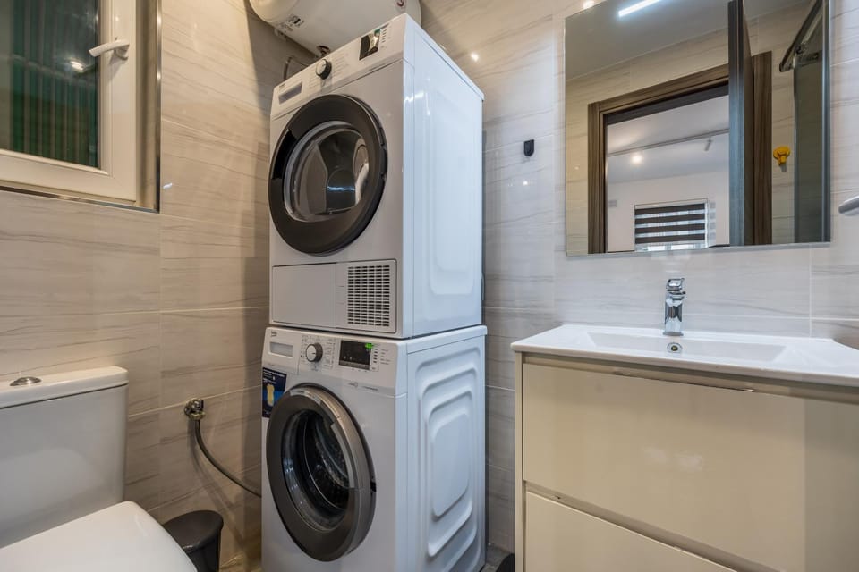 Shower, Bathroom, towels, washing machine, dryer