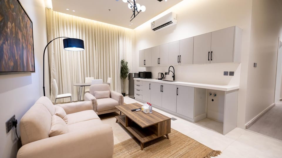 TV and multimedia, Coffee/tea facilities, Kitchen or kitchenette, Living room, Seating area, stove