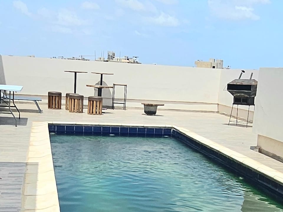 Swimming pool, sunbed