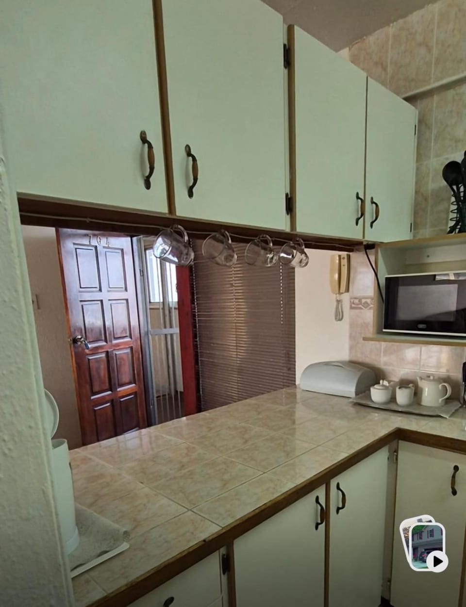 Kitchen or kitchenette, microwave