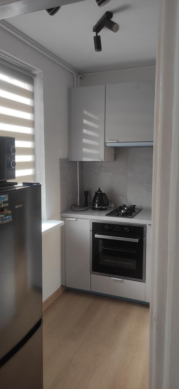 Kitchen or kitchenette, oven, stove