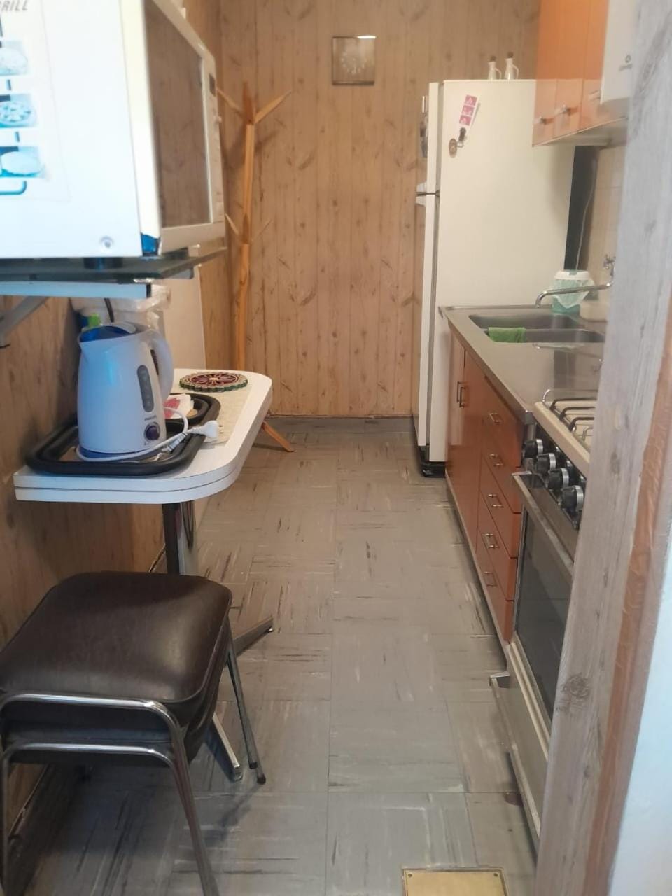 Kitchen or kitchenette, oven, stove