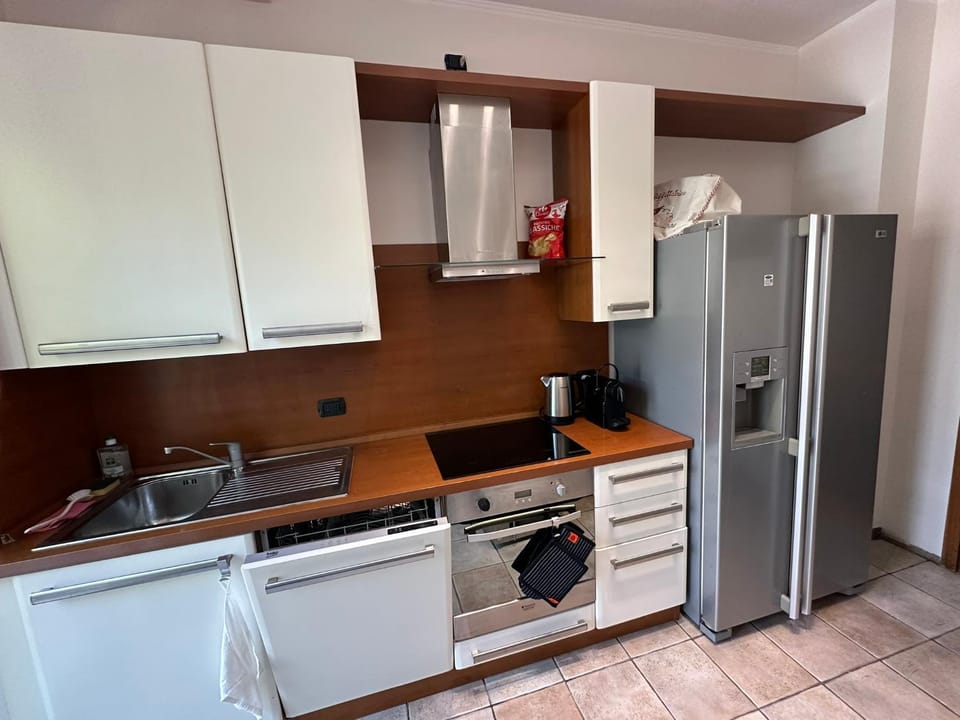 Kitchen or kitchenette, dishwasher, oven, stove, toaster