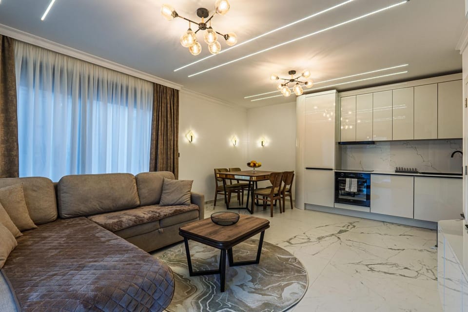 Kitchen or kitchenette, Living room, Seating area, Dining area, stove