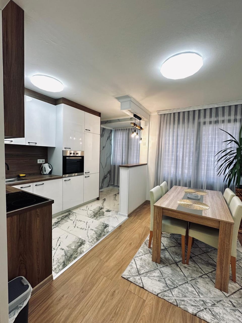 Kitchen or kitchenette, Photo of the whole room, Seating area, Dining area, oven, stove