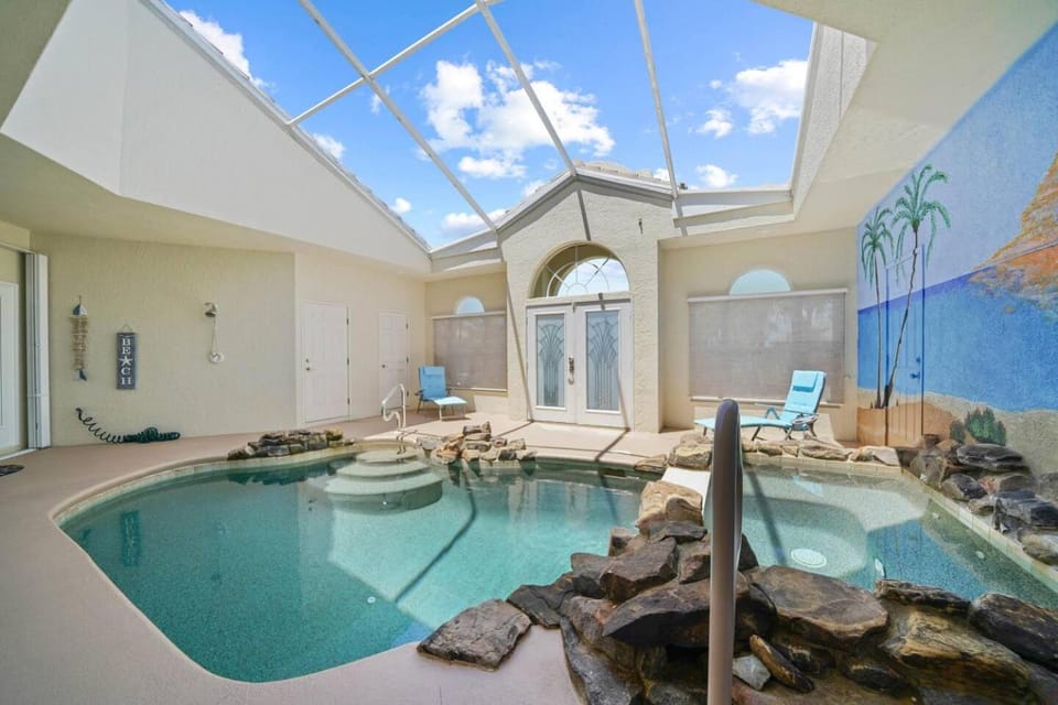 Waterfront home Wcourtyard pool House in Charlotte Park
