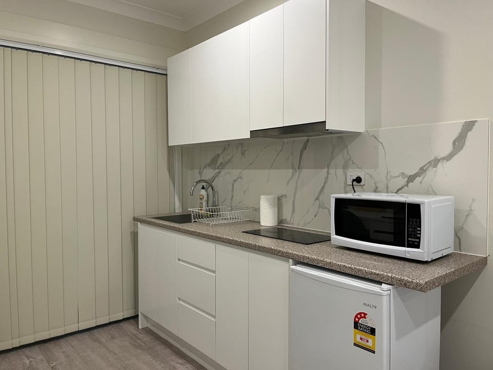 Kitchen or kitchenette, stove