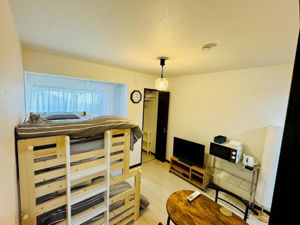 Communal lounge/ TV room, TV and multimedia, Photo of the whole room, Evening entertainment, Bedroom