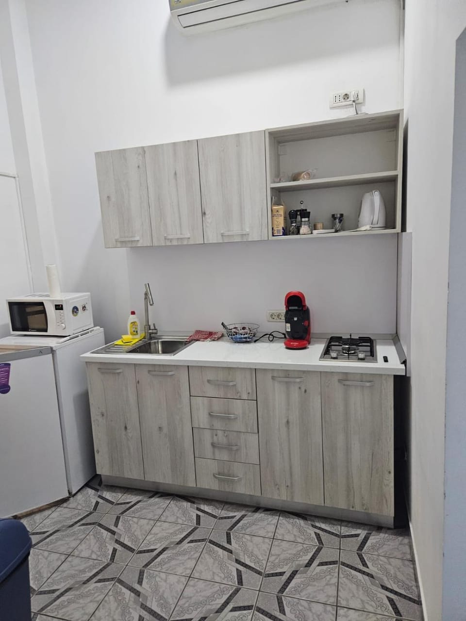 Kitchen or kitchenette, stove, toaster