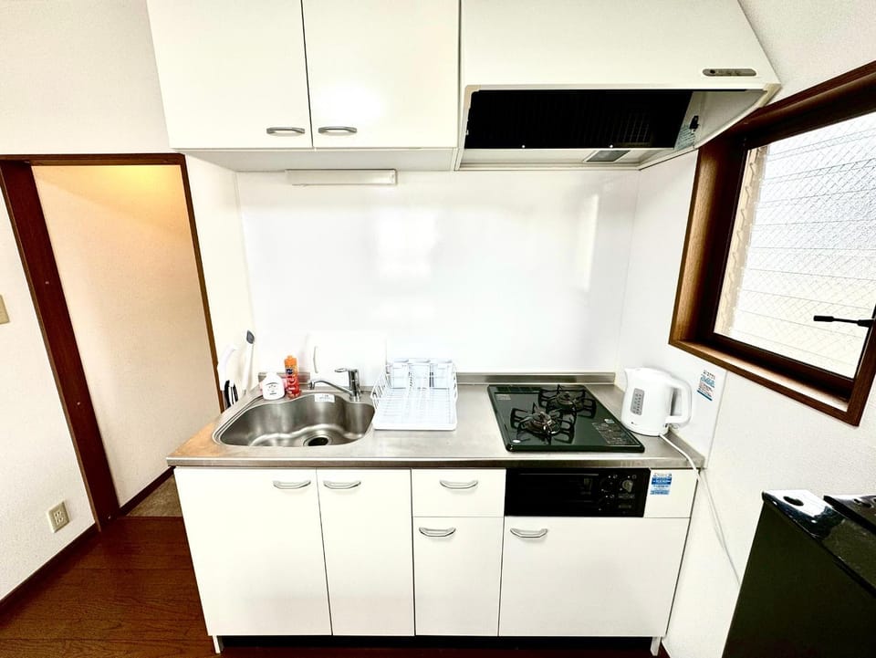 Kitchen or kitchenette, stove