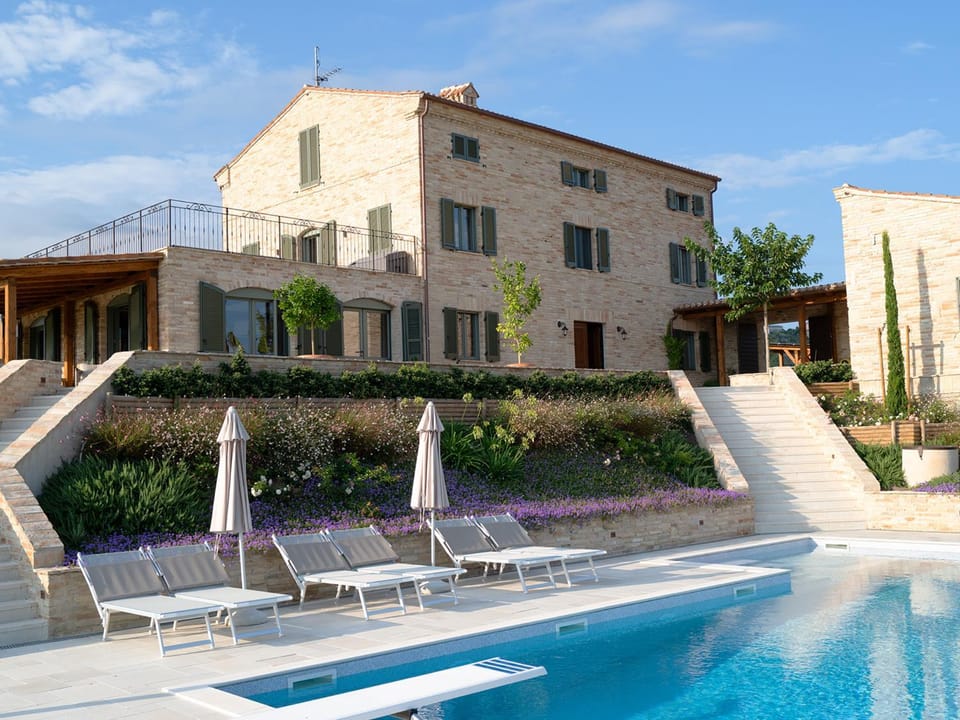 Property building, Day, Pool view, Swimming pool, sunbed