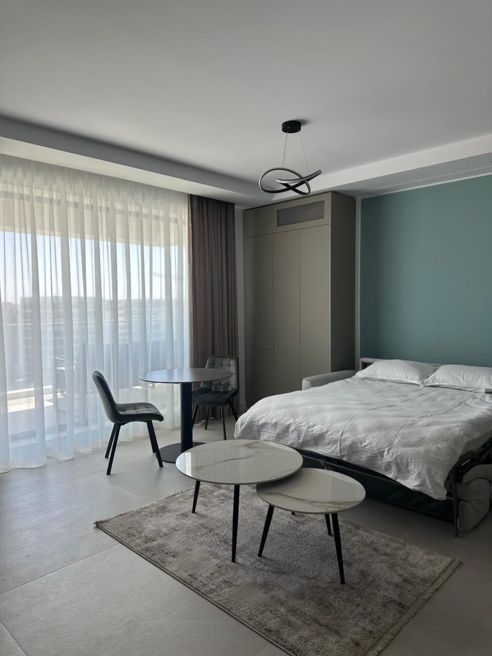Bed, View (from property/room), Balcony/Terrace, Seating area, Dining area, Lake view, Sea view, air conditioner