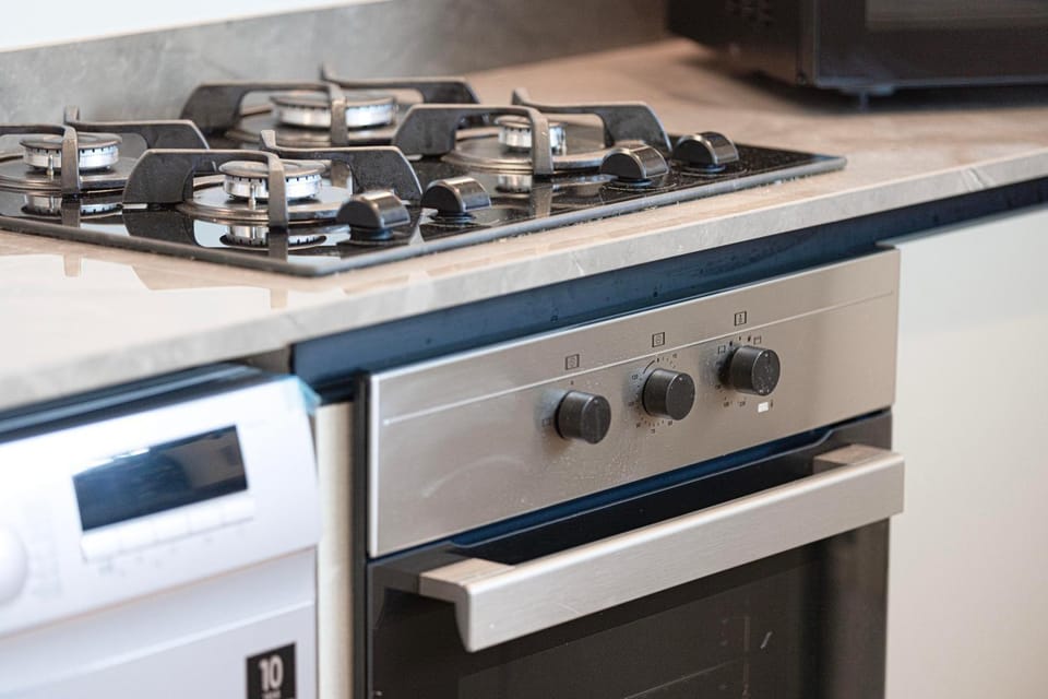Kitchen or kitchenette, stove