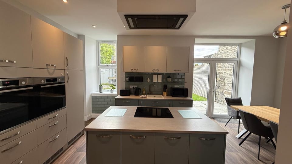 Kitchen or kitchenette, Dining area, dishwasher, oven, stove, toaster