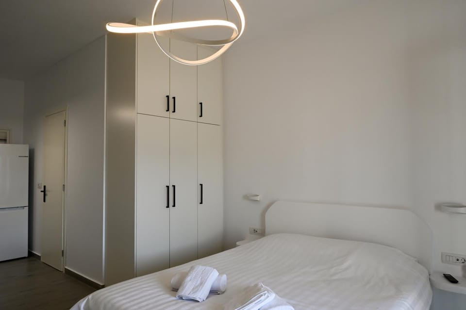 Bed, Bedroom, towels, wardrobe