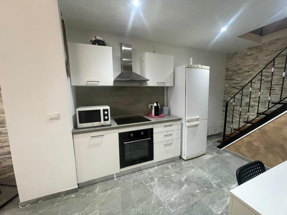 Kitchen or kitchenette, oven, stove
