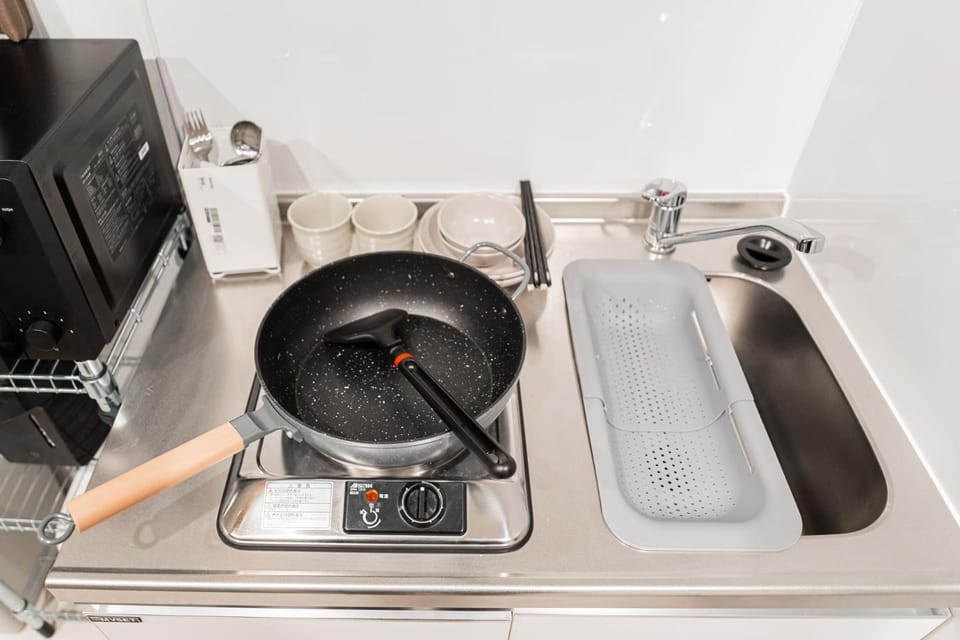 Kitchen or kitchenette, stove