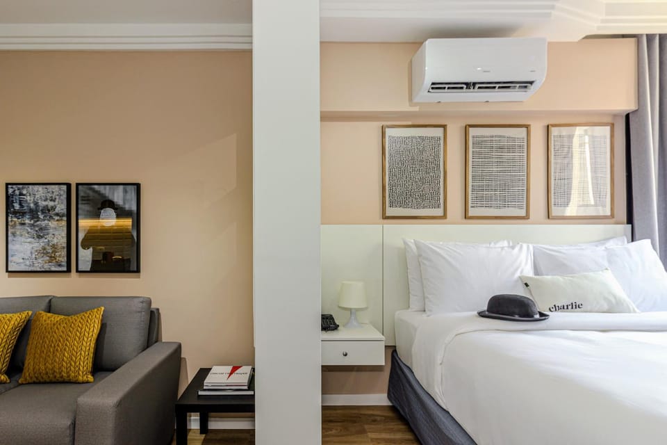 Bed, Day, Living room, Seating area, Bedroom, air conditioner