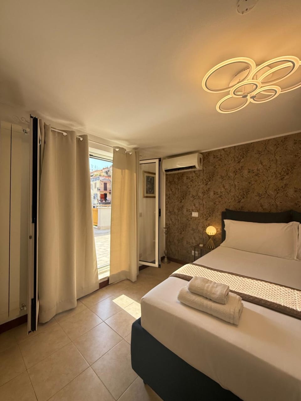 Bed, Photo of the whole room, Bedroom, towels, air conditioner